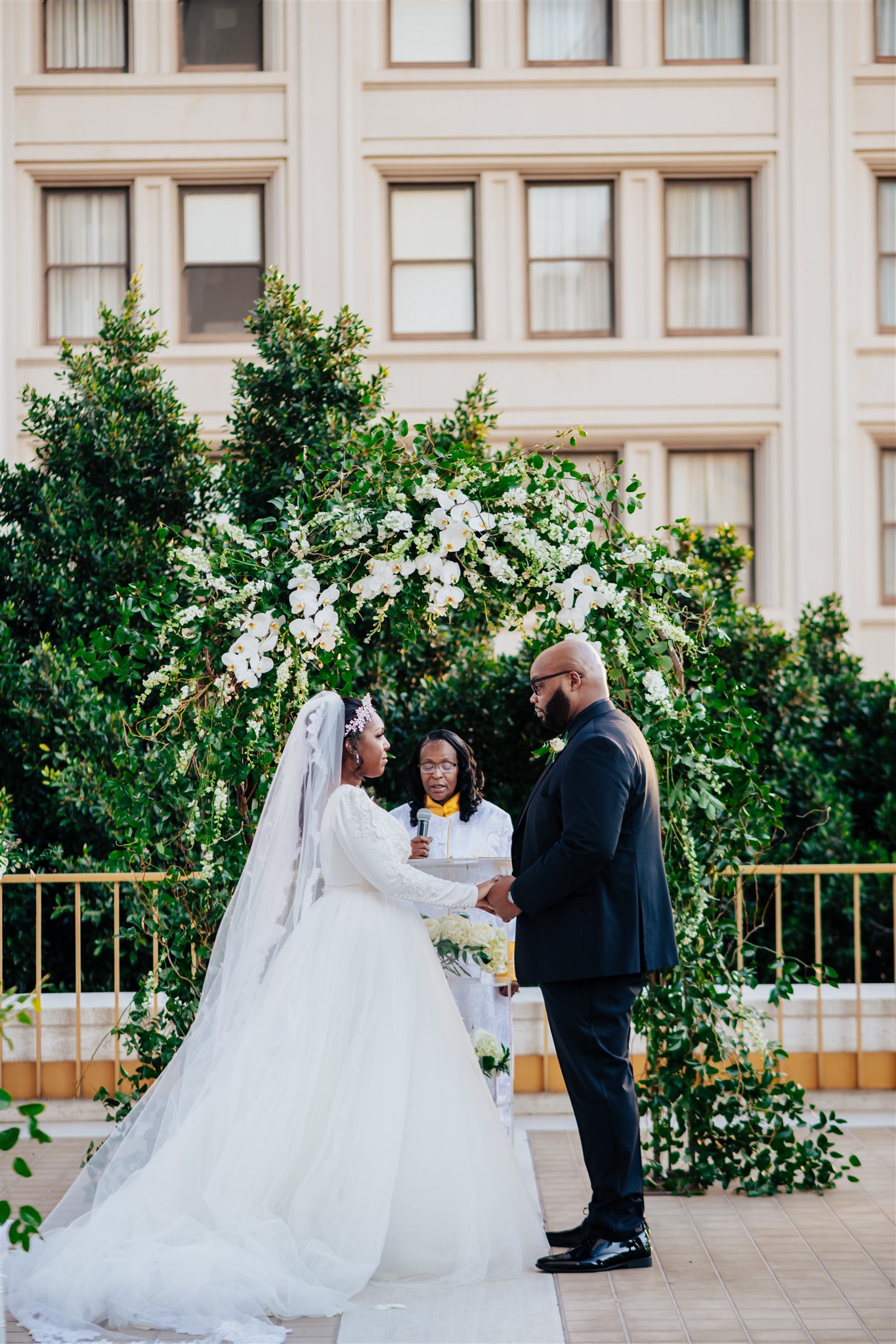 black couple getting married on a rooftop